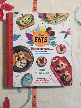 Disney EATS Cookbook with Bright Red Spine and Multicolor Cover
